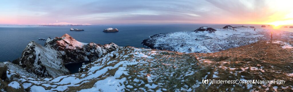 Surpassed by nature Moonrise and sunset view from Heimaklettur, Vestmannaeyjar, Iceland.