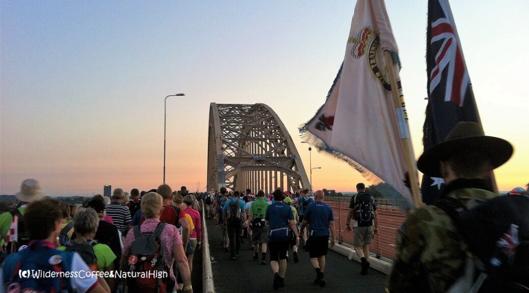Crossing the Waal river bridge in Nijmegen on the first day of the Vierdaagse Walk of the World, The Netherlands.