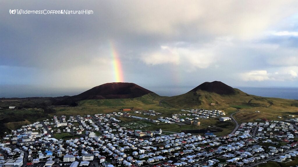 Eldfell volcano erupting a rainbow ;-) Eldfell volcano erupting a rainbow, Heimaey, Vestmannaeyjar, Iceland.