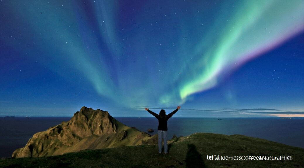 Summoning the northern lights on Heimaey, Vestmannaeyjar, Iceland.
