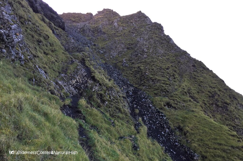Wall of rocks Blátindur hike, Heimaey, Vestmannaeyjar, Iceland.