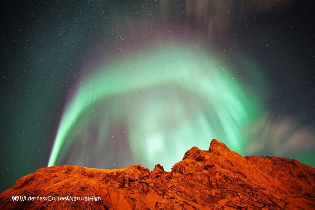 Electrical northern lights Electrical northern lights above Blátindur, Vestmannaeyjar, Iceland.