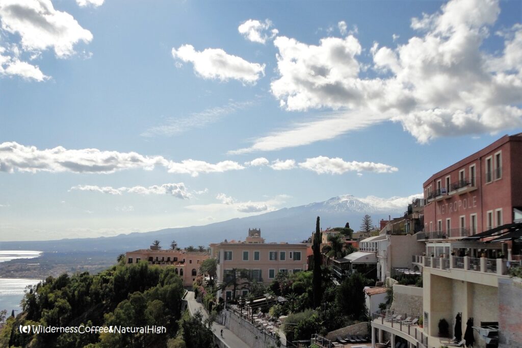 Etna looming behind Taormina on Sicily, Italy.
