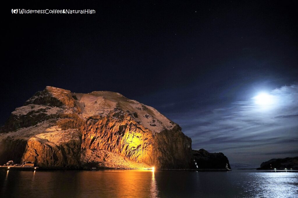 New Year's candles on Heimaklettur, Vestmannaeyjar, Iceland.