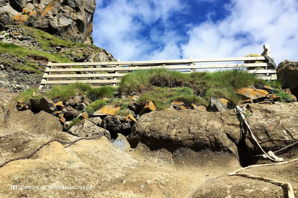 Heimaklettur sheepcage ledge with ropes, Vestmannaeyjar, Iceland.