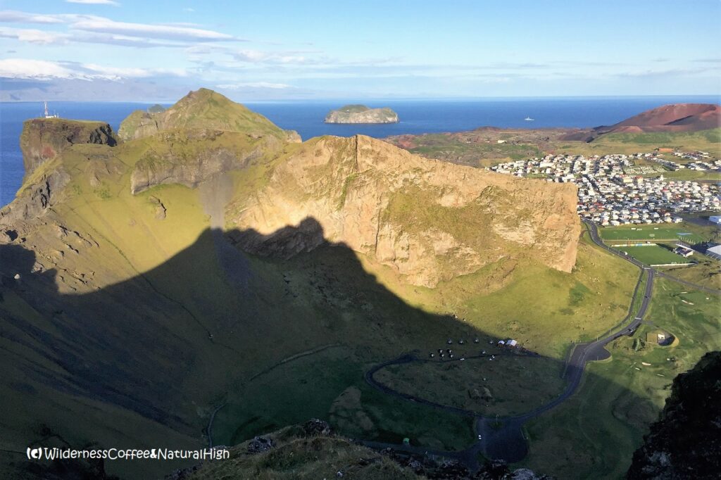 The mighty shadow of Blátindur Blátindur shadow on Herjólfsdalur, Vestmannaeyjar, Iceland.