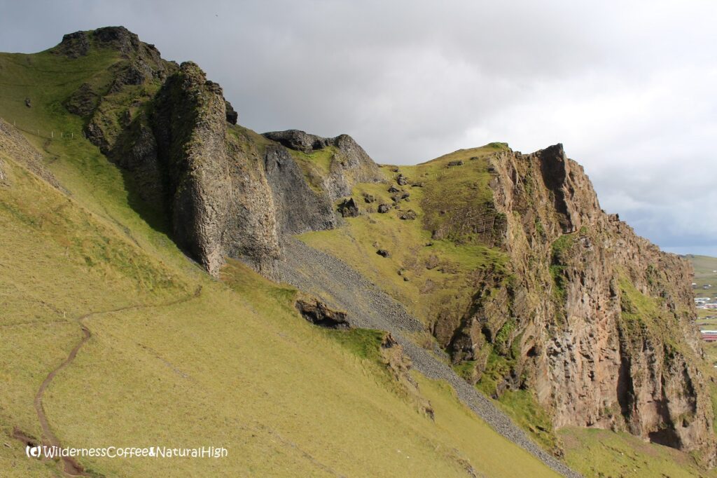 Steep slope, Herjólfsdalur, Heimaey, Vestmannaeyjar, Iceland.