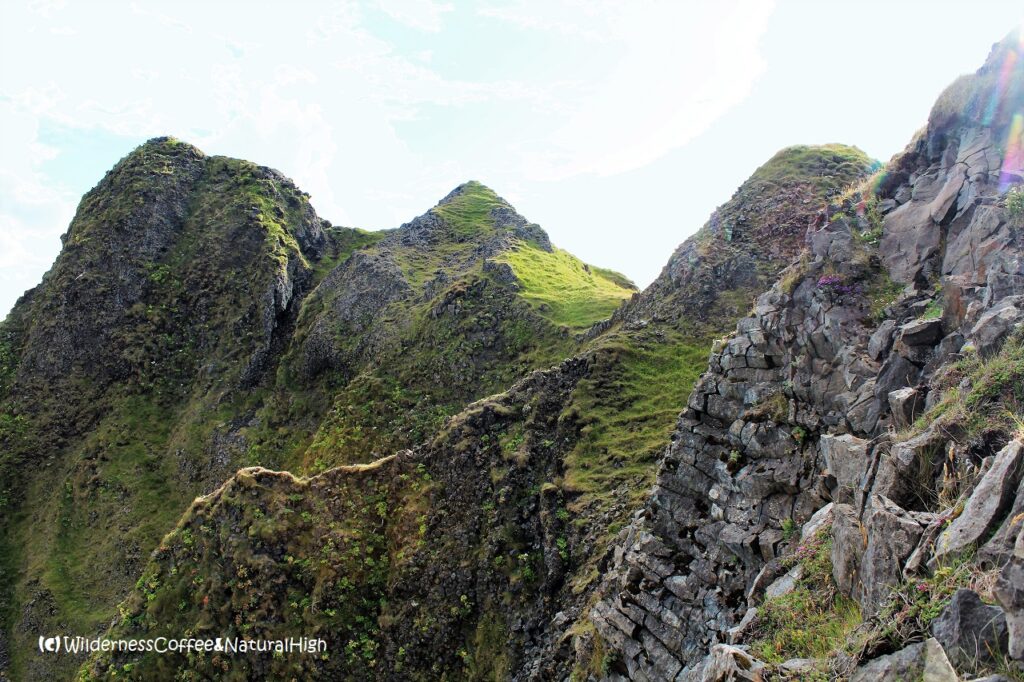 The daunting peaks of Dalfjall The daunting peaks of Dalfjall, Heimaey, Vestmannaeyjar, Iceland.