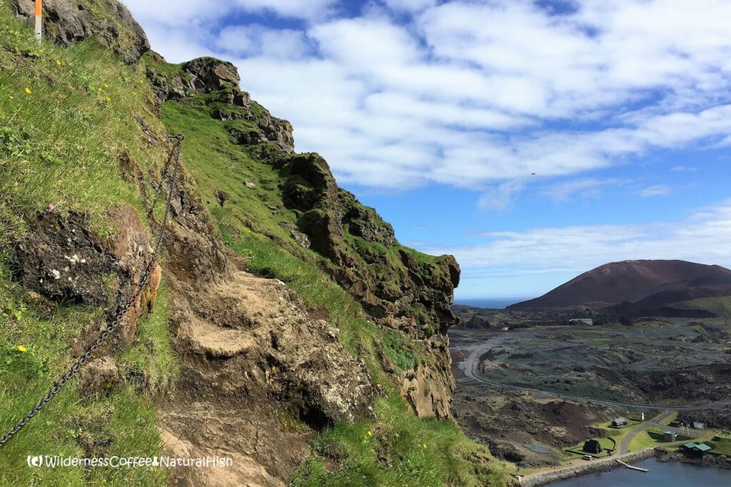 Heimaklettur hike, chains along the upper track, Vestmannaeyjar, Iceland.