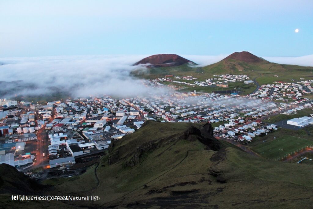 Dalalæða flowing into Heimaey Dalalæða fog flowing into Heimaey, Vestmannaeyjar, Iceland.
