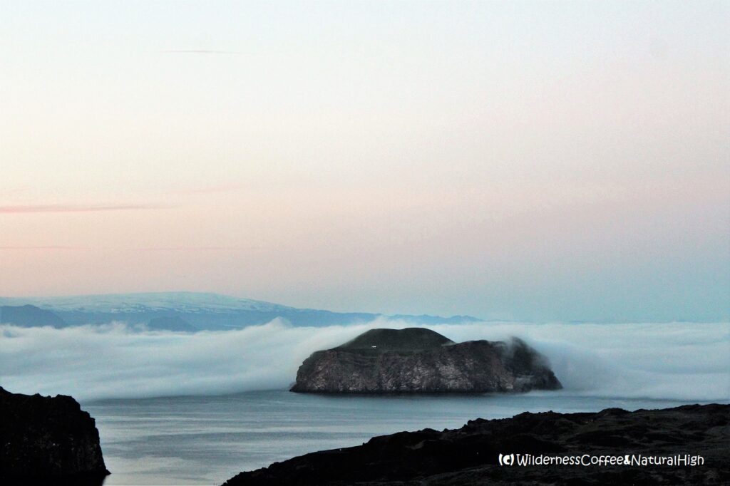 Dalalæða rolling over Bjarnarey Dalalæða rolling in over Bjarnarey, Vestmannaeyjar, Iceland.