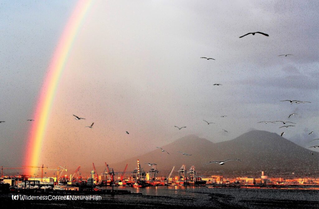 Naples harbour and Vesuvius Naples harbour and rainbow, Vesuvius, Italy.