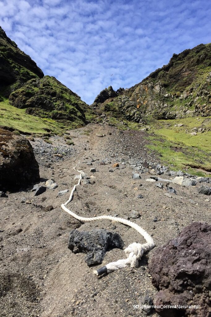 Rope hanging down the slope Ropes on the Klif hike, Heimaey, Vestmannaeyjar, Iceland.