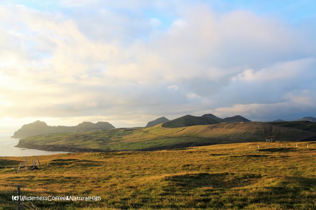 View from Stórhöfði to Herjólfsdalur View from Stórhöfði, Heimaey coastline, Vestmannaeyjar, Iceland.