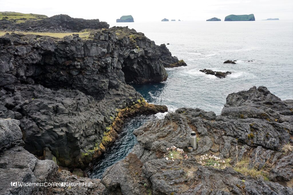 Wilderness Coffee on the rocks Stórhöfði coastal track, Vestmannaeyjar, Iceland.