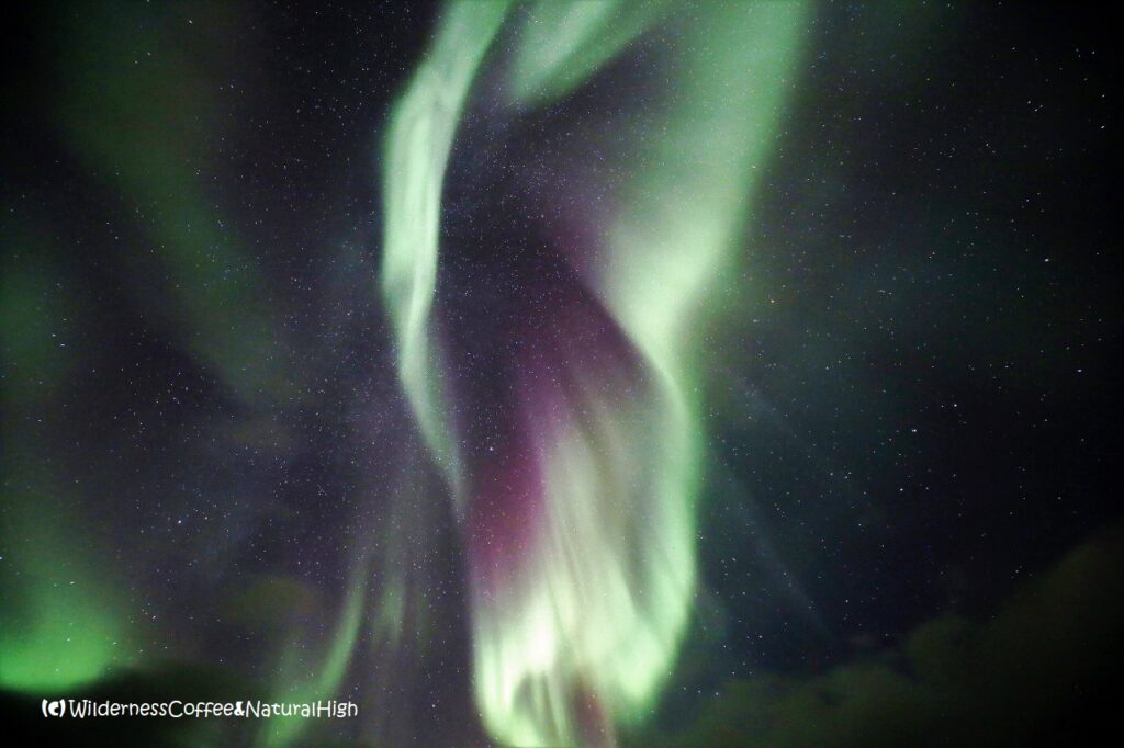 Electromagnetic charged particles creating brilliant displays Electromagnetic charged particles creating brilliant displays of northern lights. Stykkishólmur, Snæfellsnes, Iceland.