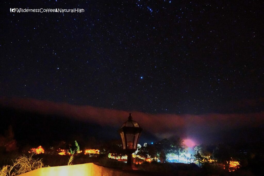 Red rolling curtain cloud and starry skies, La Palma, Canary Islands.